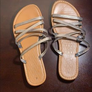 Slip on sandals with gold straps